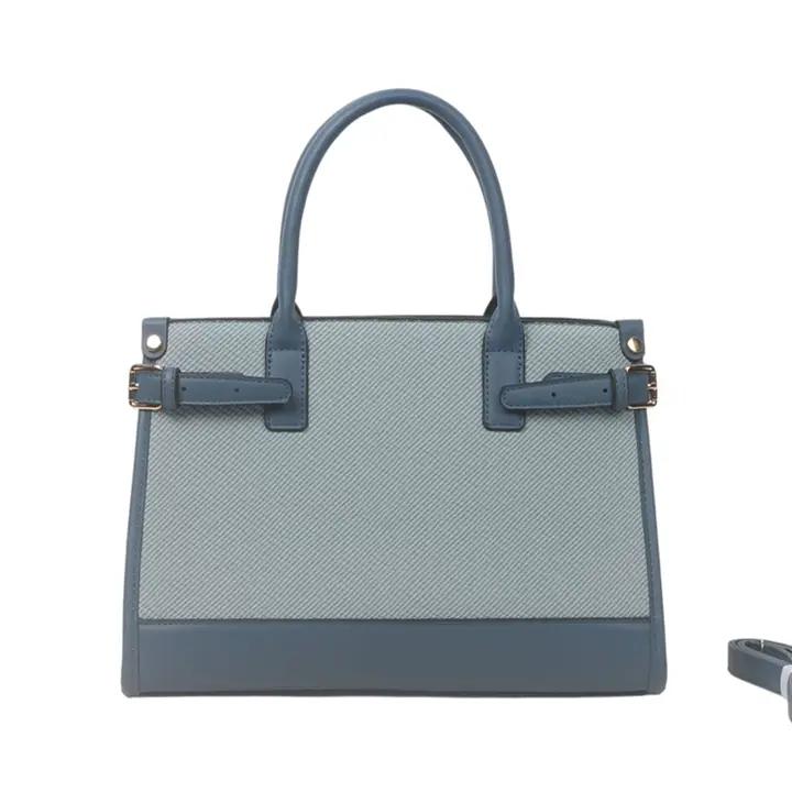 Sac à main bleu céleste — finitions nobles, double porté